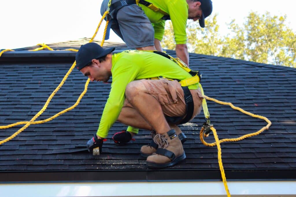Roofers Repairing Roof
